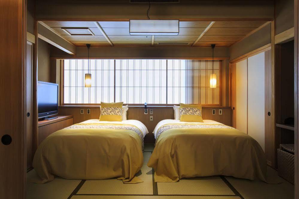 Fujisan Onsen Bessho Sasa Hotel Fujiyoshida Bagian luar foto